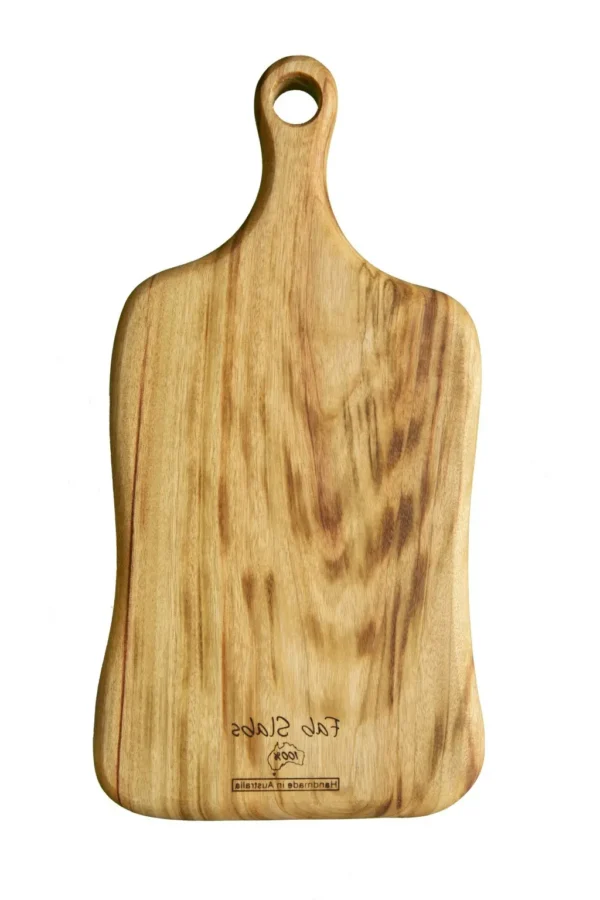 A wooden cutting board with the name " hope " written on it.