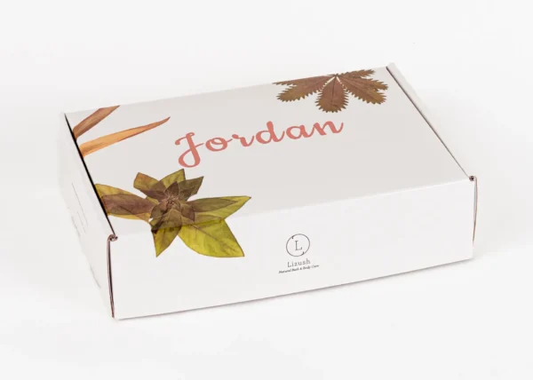 A white box with leaves and the name jordan