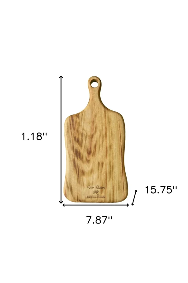 A wooden cutting board with measurements on it.