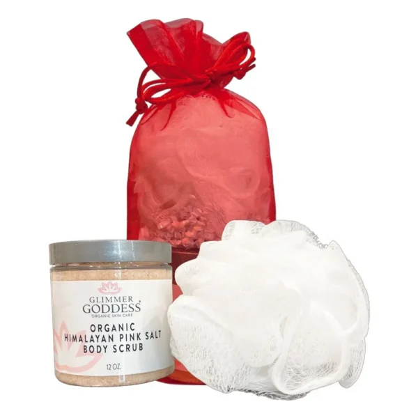 A red bag with a body scrub and lotion